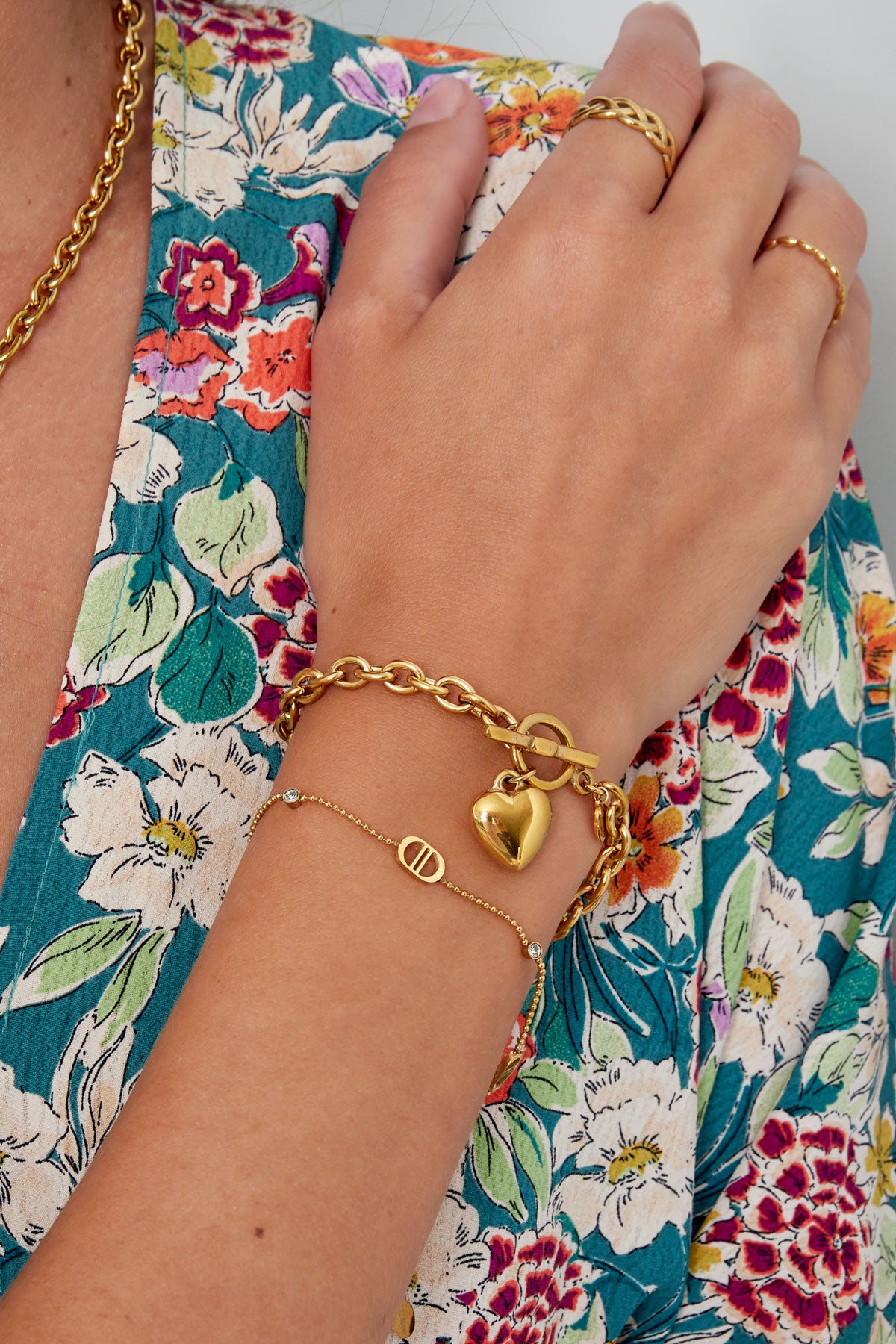 Armband logo's en steentjes - goud